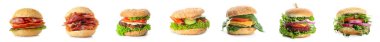 Beyaza izole edilmiş farklı lezzetli hamburgerler. 