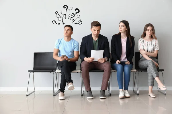 Young people waiting for job interview indoors