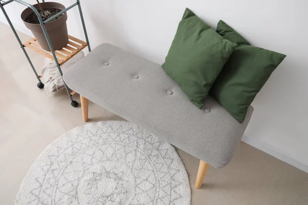 Soft Bench Green Pillows Light Wall — Stock Photo, Image