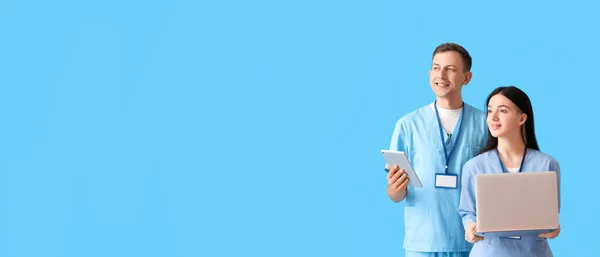 Medical Assistants Laptop Tablet Computer Light Blue Background Space Text — Stock Photo, Image