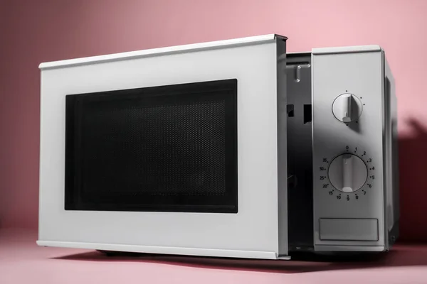 New Modern Microwave Oven Pink Background — Stock Photo, Image