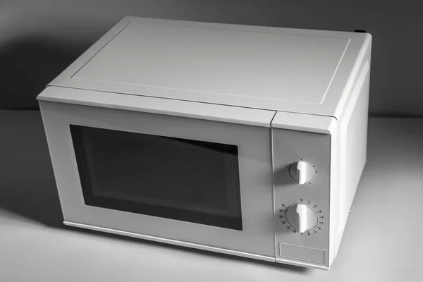 New Modern Microwave Oven Light Background — Stock Photo, Image