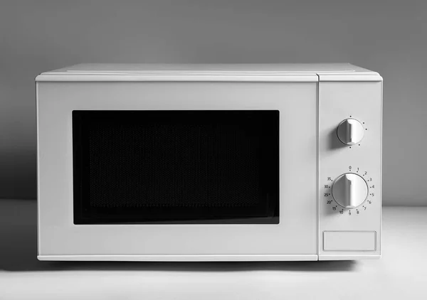 New Modern Microwave Oven Light Background — Stock Photo, Image