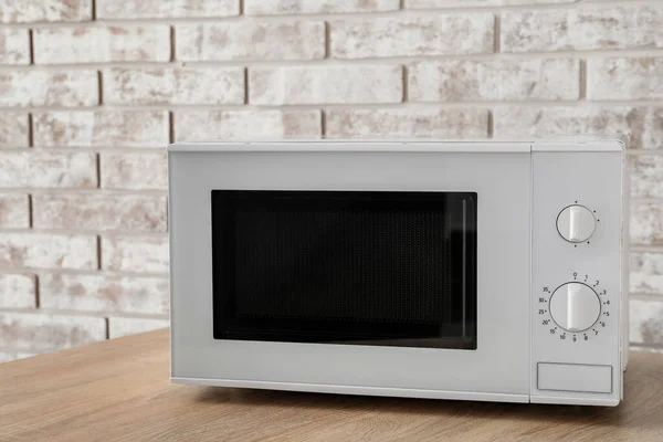 New Modern Microwave Oven Wooden Table — Stock Photo, Image