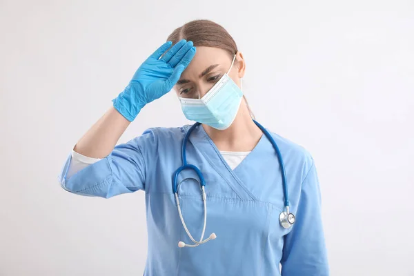 Tired Female Nurse Light Background — Stock Photo, Image