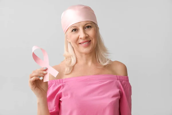 Mature Woman Pink Ribbon Light Background Breast Cancer Awareness Concept — Stock Photo, Image