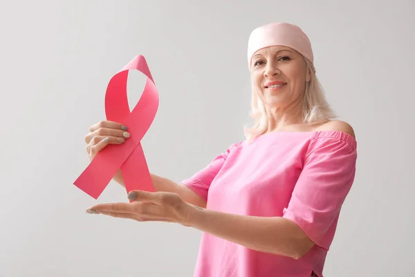 Mature Woman Pink Ribbon Light Background Breast Cancer Awareness Concept — Stock Photo, Image