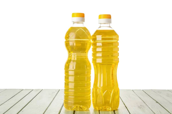 Bottles Sunflower Oil Color Wooden Table White Background — Stock Photo, Image