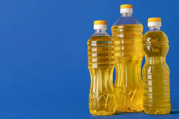 Bottles Sunflower Oil Blue Background — Stock Photo, Image