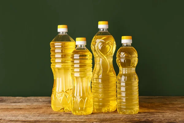 Bottles Sunflower Oil Table Green Background — Stock Photo, Image
