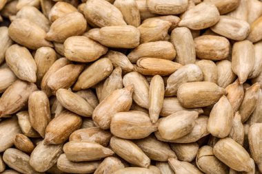 Arkaplan olarak soyulmuş ayçiçeği tohumlarının yakın görünümü