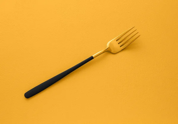 Elegante Tenedor Acero Inoxidable Sobre Fondo Amarillo — Foto de Stock