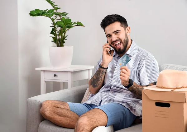 Handsome Man Credit Card Talking Mobile Phone Home Online Shopping — Stock Photo, Image