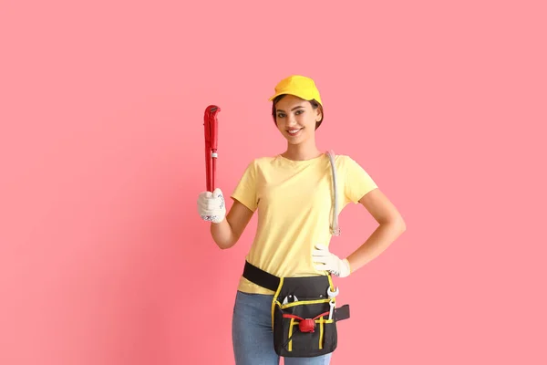 Female Plumber Pipe Wrench Pink Background — Stock Photo, Image