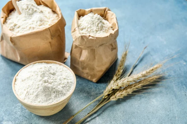 Wheat Ears Paper Bags Bowl Flour Blue Background Closeup — Stock Photo, Image