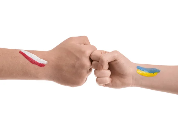 Volunteers Drawn Flags Ukraine Poland Bumping Fists White Background — Stock Photo, Image