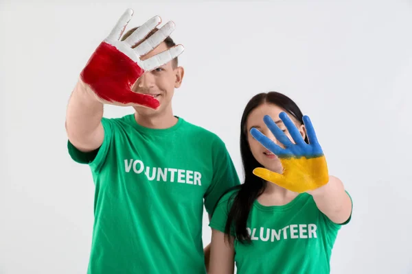 Volunteers Painted Hands Colors Ukrainian Polish Flags White Background — Stock Photo, Image