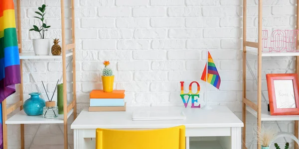 Modern Workplace Racks Rainbow Flags White Brick Wall — Stock Photo, Image