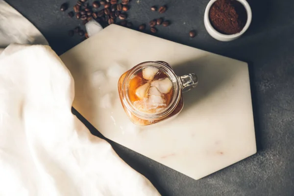 Mason Pot Met Koude Koffie Melk Grijze Tafel — Stockfoto