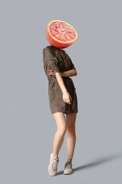 Woman Ripe Blood Orange Instead Her Head Grey Background — Stock Photo, Image