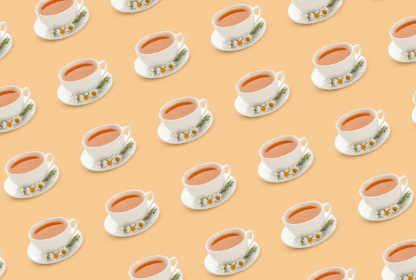 Many Cups Tasty Chamomile Tea Beige Background Pattern Design — Stock Photo, Image