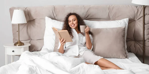 Morning Young African American Woman Drinking Tea Reading Book Bed — Stock Photo, Image