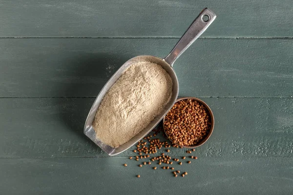 Scoop Flour Bowl Buckwheat Grains Dark Wooden Background — Stock Photo, Image
