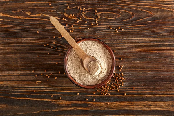 Bowl Flour Spoon Buckwheat Grains Dark Wooden Background — Stock Photo, Image