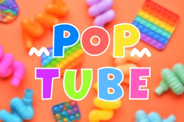 Metin POP TUBE ve turuncu arkaplanda birçok renkli kıpırtı