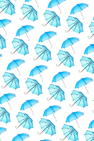 Viele Blaue Regenschirme Auf Weißem Hintergrund Muster Für Die Gestaltung — Stockfoto