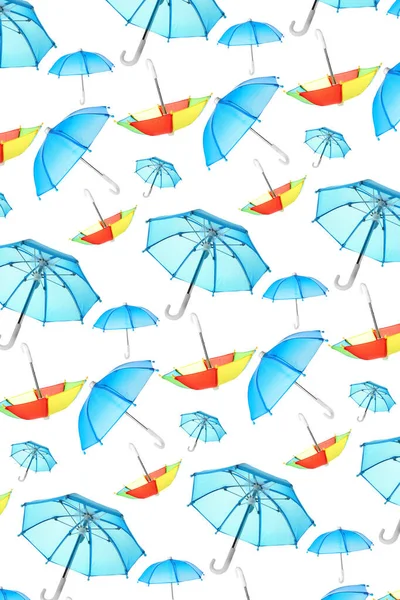 Muchos Paraguas Sobre Fondo Blanco Patrón Diseño —  Fotos de Stock