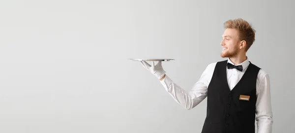 Handsome Waiter Empty Tray Light Background Space Text — Stock Photo, Image