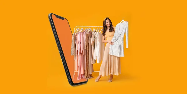 Stylish Young Woman Stylish Clothes Hanger Modern Mobile Phone Yellow — Stock Photo, Image