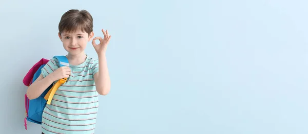 Cute Little Schoolboy Showing Light Blue Background Space Text — Stock Photo, Image