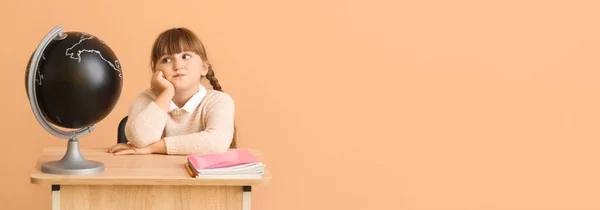Cute Little Schoolgirl Sitting Desk Globe Color Background Space Text — Stock Photo, Image
