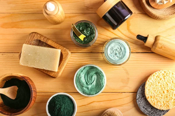 Composition Jars Spirulina Facial Mask Ingredients Bath Supplies Wooden Background — Stock Photo, Image