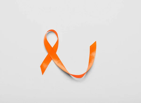 Orange Awareness Ribbon Grey Background Kidney Cancer Concept — Stockfoto