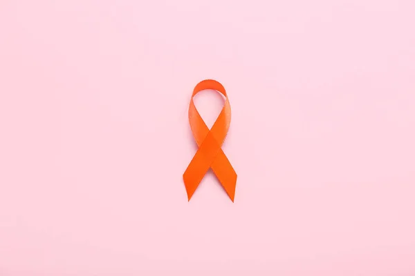 Orange Awareness Ribbon Pink Background Kidney Cancer Concept — Stock Photo, Image