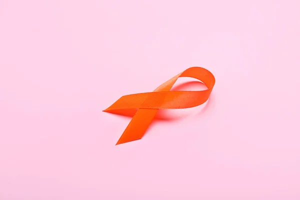 Orange Awareness Ribbon Pink Background Kidney Cancer Concept — Stock Photo, Image