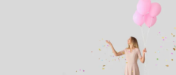 Beautiful Happy Young Woman Balloons Confetti Light Background Space Text — Stock Photo, Image