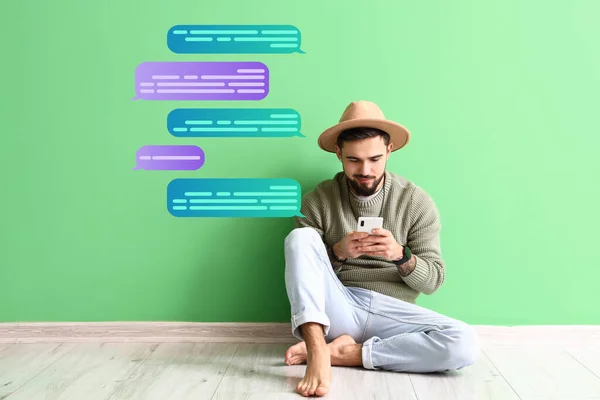 Handsome Man Mobile Phone Chatting Online Green Wall — Stock Photo, Image