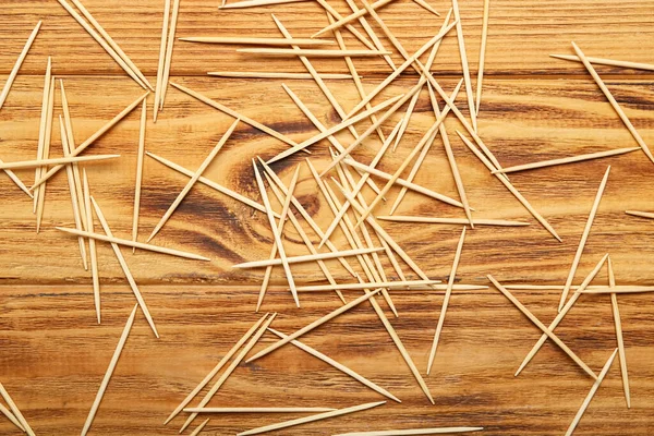 Scattered Toothpicks Wooden Background — Stock Photo, Image