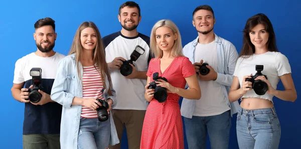 Group Young Photographers Blue Background — Stockfoto