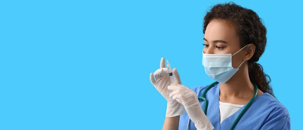 African American Nurse Syringe Blue Background Space Text — Stockfoto