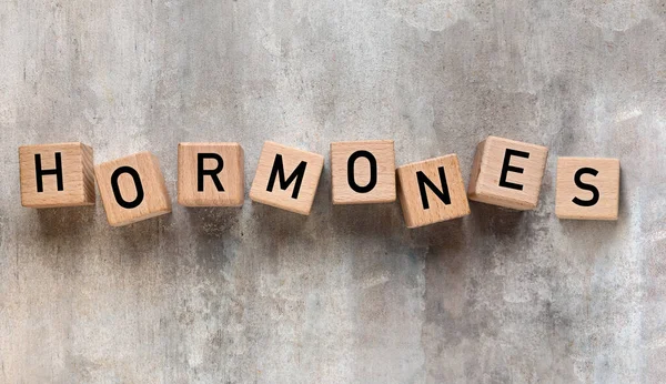 Word Hormones Made Cubes Grunge Background — Stock Photo, Image