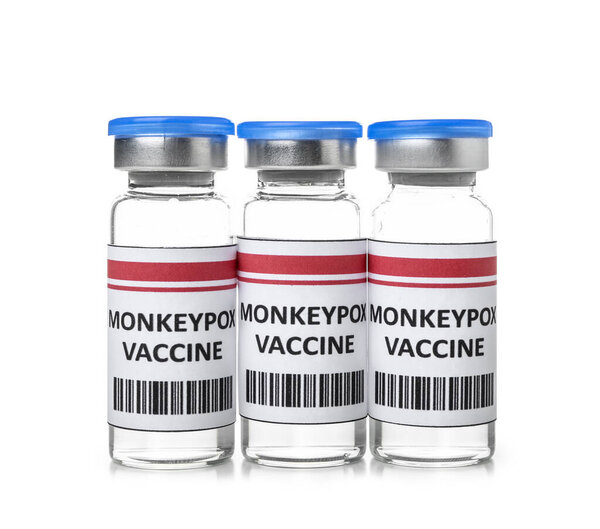 Ampules of monkeypox vaccine on white background