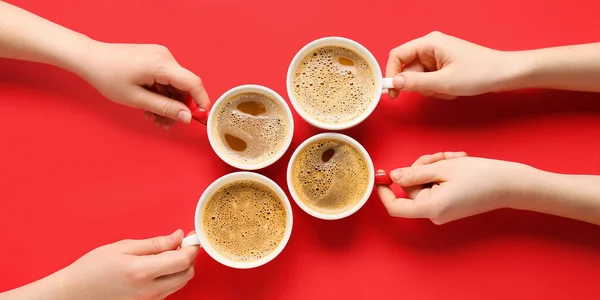 Female Hands Cups Coffee Red Background Top View — Stockfoto
