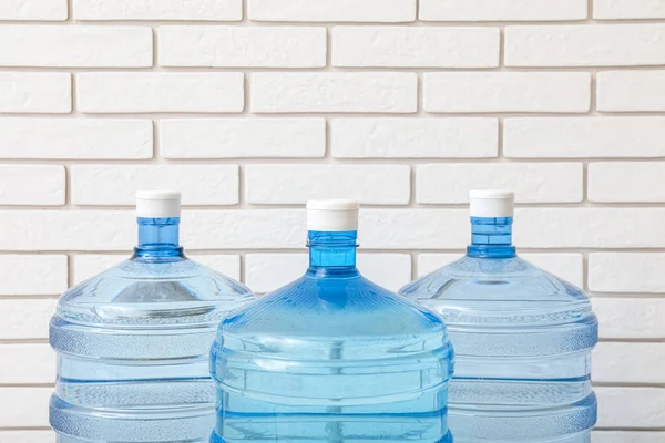 Bottles Clean Water Light Brick Wall — Stock Photo, Image