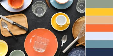 Karanlık arka planda bir sürü sofra takımı ve mutfak malzemesi var. Farklı renk desenleri