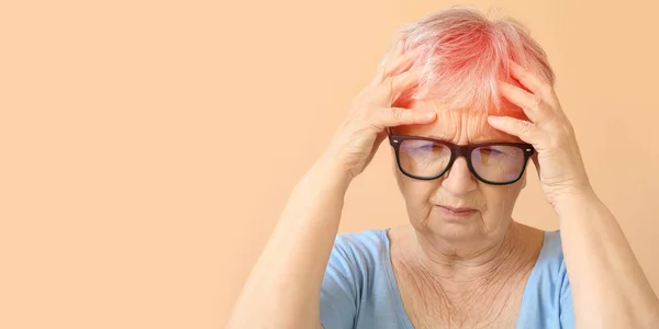 Senior Woman Suffering Headache Beige Background Space Text — Stock Photo, Image